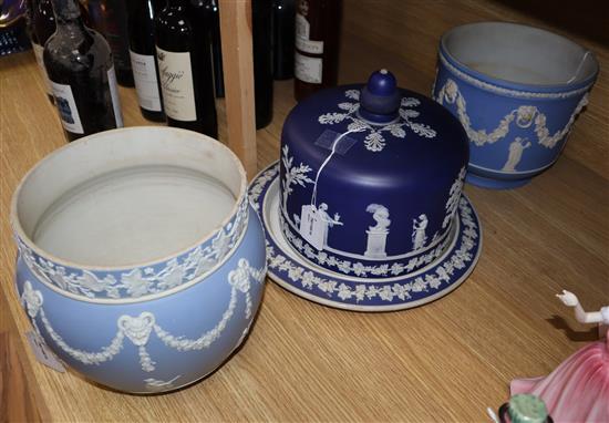 A Wedgwood 19th century blue and white Jasperware stilton dish and cover and two Jasperware jardinieres,